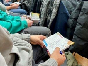 Teilnehmende mit Veranstaltungsplan